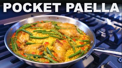 Paella Valencian-style, with green beans and chicken wings